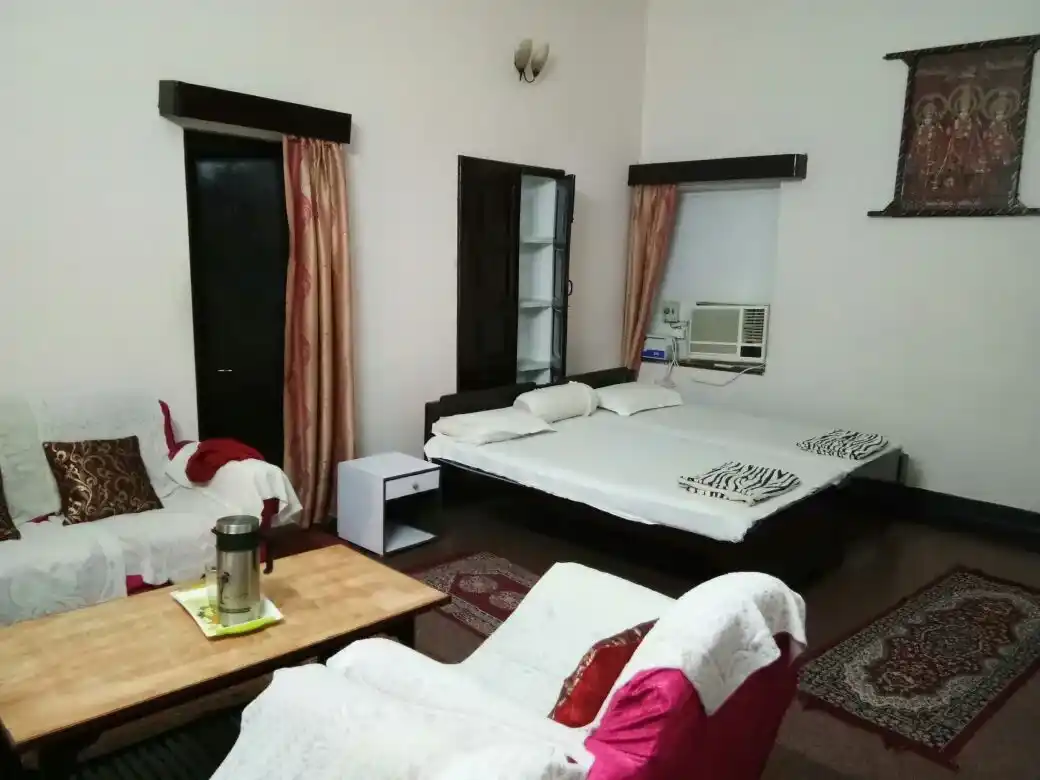 Clean AC room at Shriman Narayan Mandir Dharamshala near Somnath Temple
